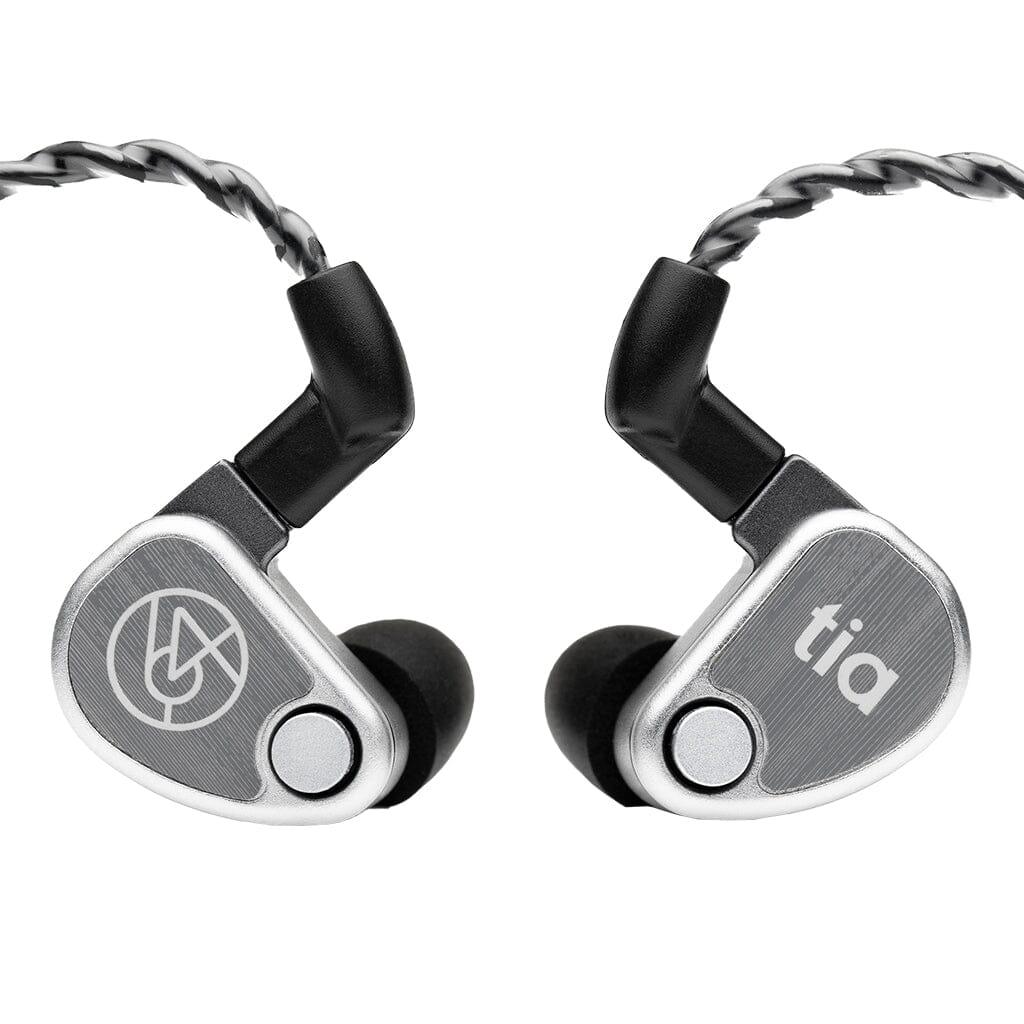 A pair of 64 Audio U12t In-Ear Headphones by 64 Audio, with black eartips, silver housing, circular logo on the left, tia on the right, and a braided black and silver cable for natural sound reproduction.