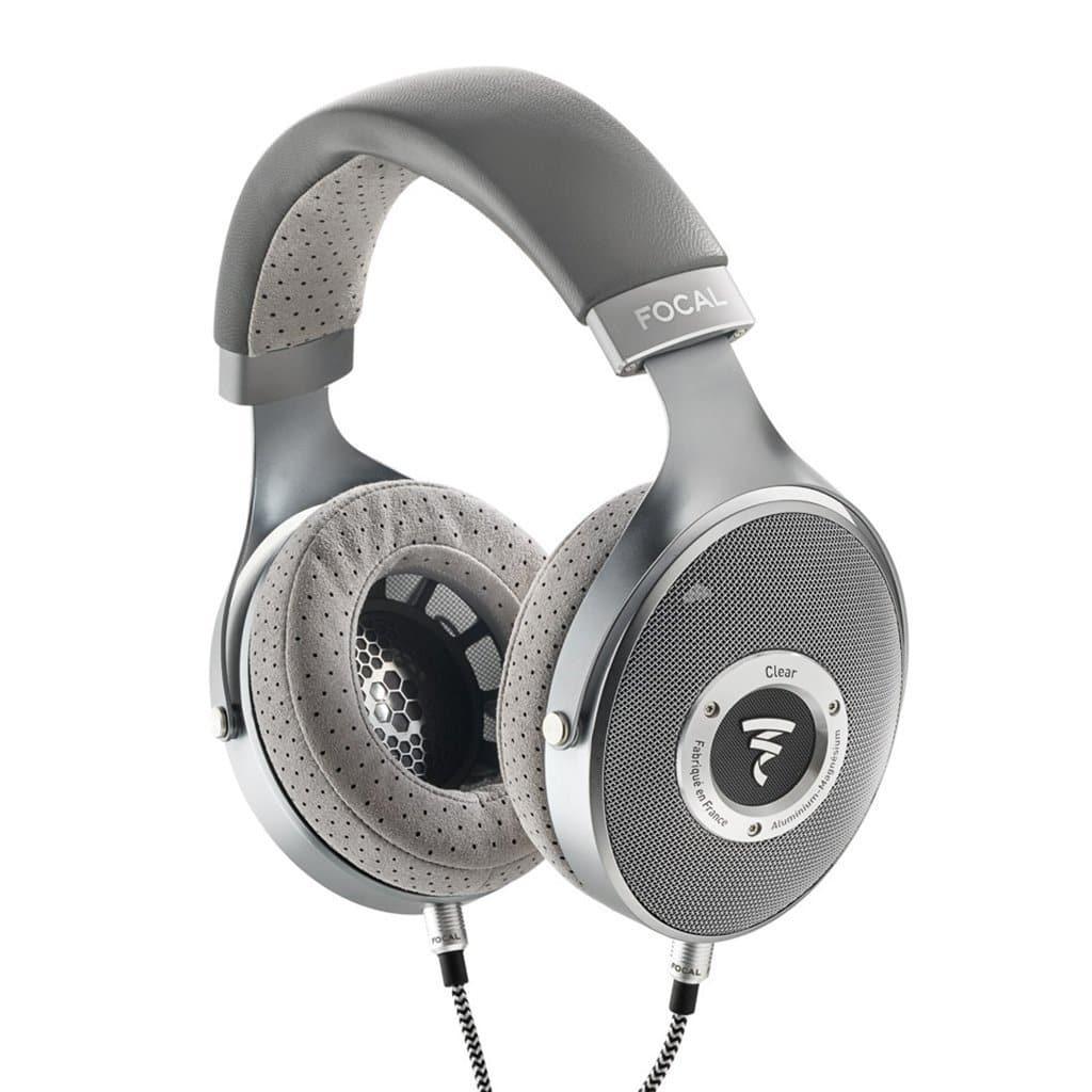 The Focal Clear Headphones are over-ear, open-back headphones in silver and gray with perforated ear pads and a padded headband. The Focal brand appears on the headband and ear cup—ideal for audio enthusiasts or headphones.com shoppers.