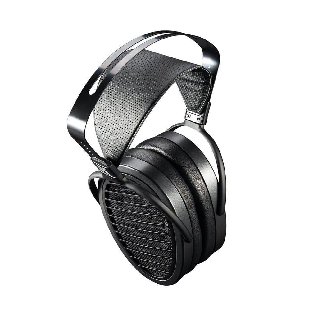 The Hifiman Arya Headphones | Stealth Magnets Edition feature a sleek black design with a wide, perforated headband and large oval ear cups with vertical grilles, showcasing an expansive soundstage against a white background.
