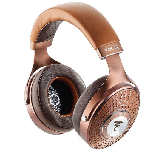 Experience high-end audio with the Focal Stellia Headphones - Open Box, featuring a copper and brown design, closed-back over-ear fit, textured earcups, Focal branding on the headband, and outstanding sound isolation.
