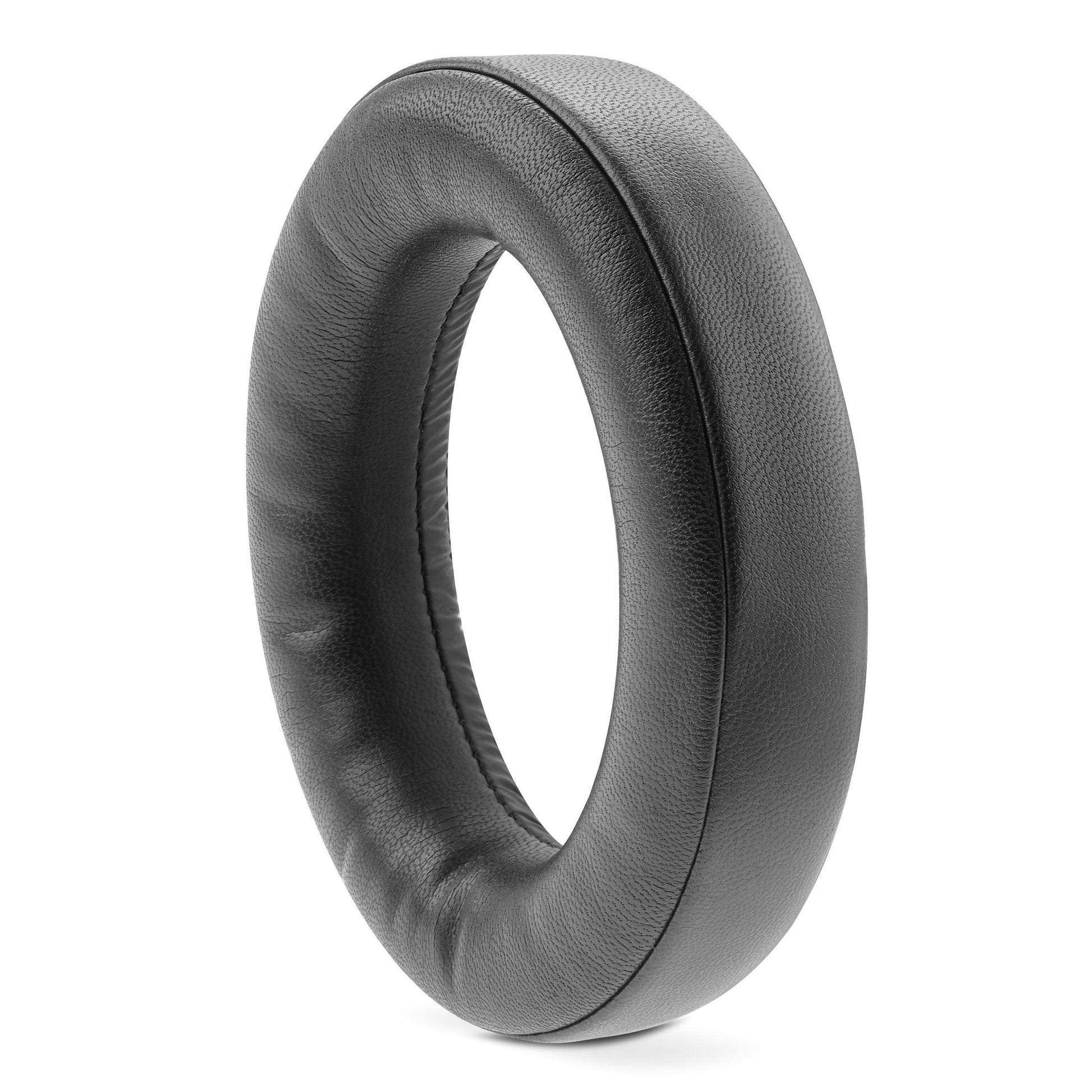 A single black leather ear cushion for Focal Bathys headphones by Focal stands upright on a white background.