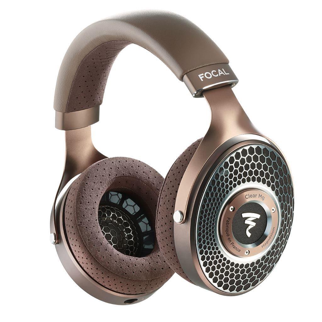 Focal Clear Mg Headphones by Focal feature a metallic brown and black open-back design with mesh grille earcups, perforated padding, and visible Clear Mg and Made in France labels on the sides.