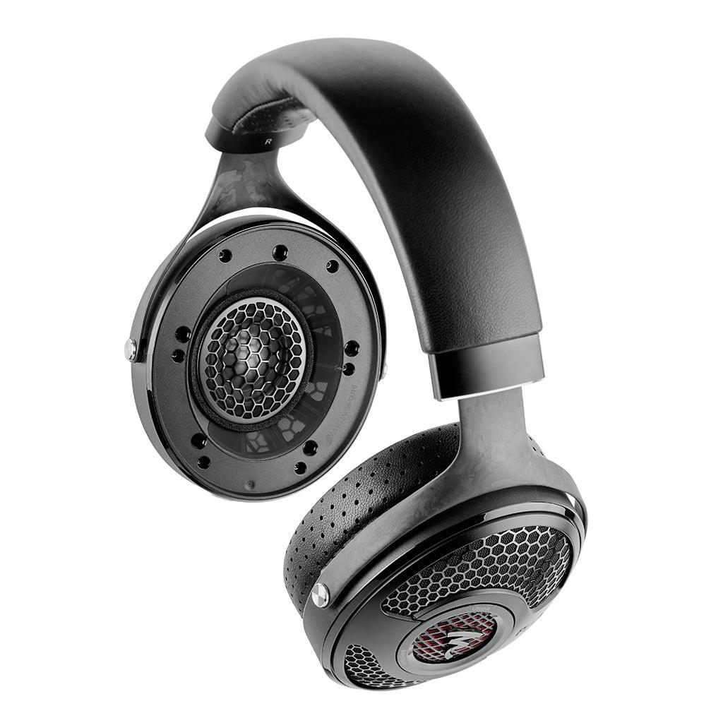 The Focal Utopia 2022 are black flagship over-ear headphones with exposed speakers and perforated ear cushions, engineered for exceptional sound quality, displayed on a white background.