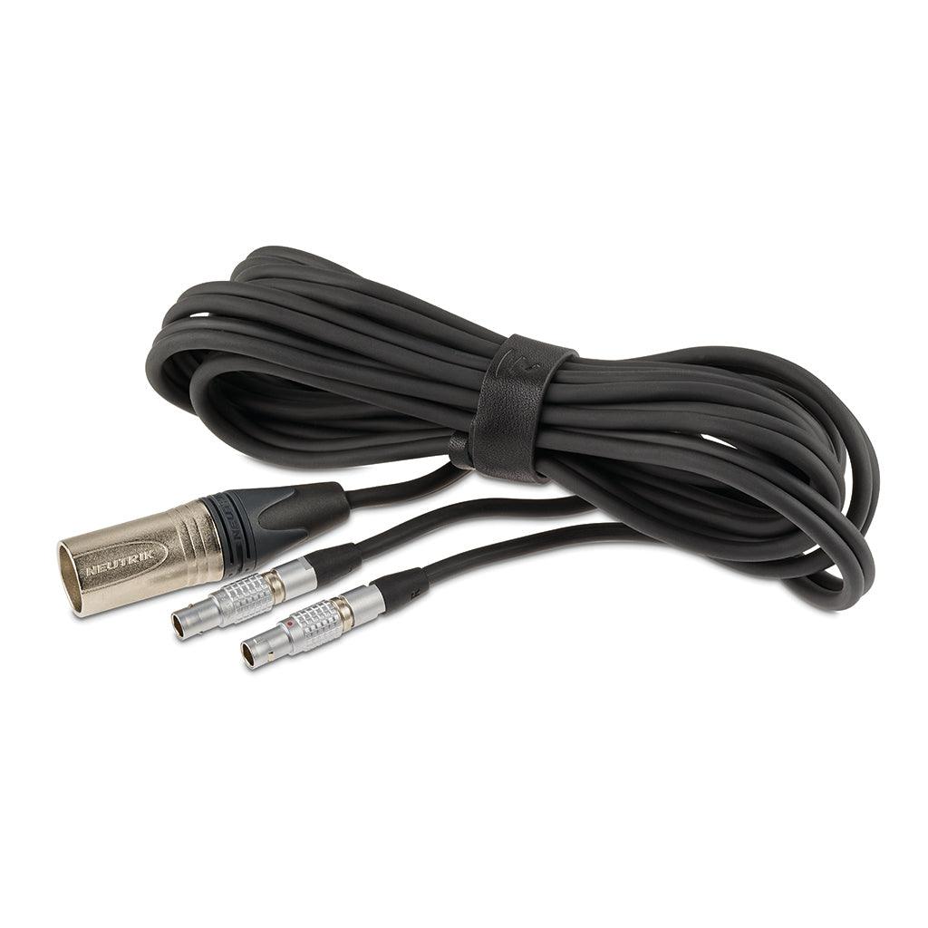 The Focal Utopia 2022 features a long black audio cable with a Neutrik XLR connector and two silver connectors, neatly coiled with a black velcro strap, ensuring pristine sound quality for flagship headphones.