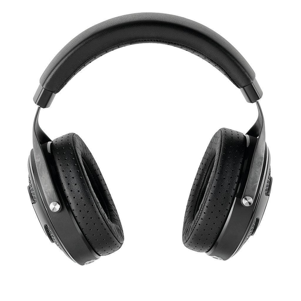 The Focal Utopia 2022 are black, over-ear flagship headphones with a padded headband and perforated ear cushions, renowned for exceptional sound quality, pictured against a white background.