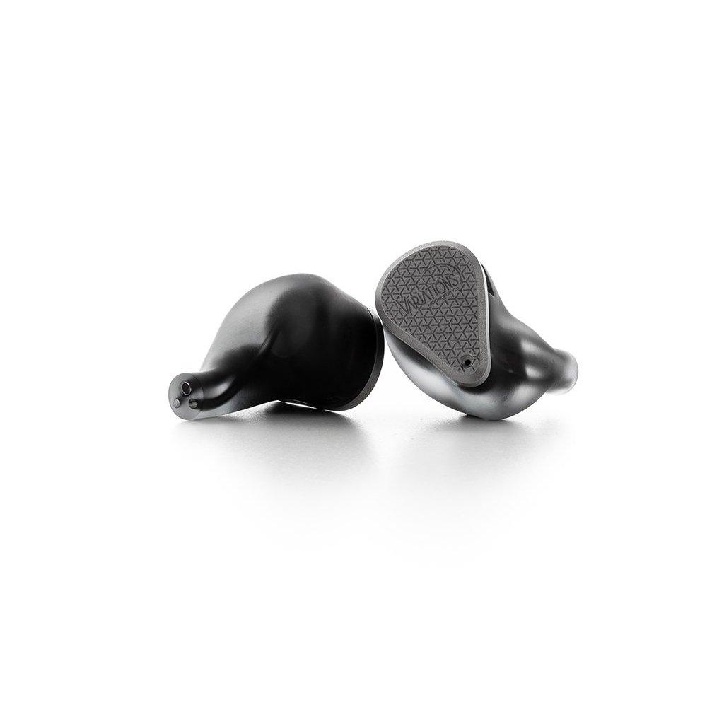 Two black pepper-shaped salt and pepper shakers are shown on a white background, one lying on its side showing a textured base marked PEPPER, reminiscent of the precision and clarity of Moondrop Variations Tribrid In-Ear Headphones by Moondrop.